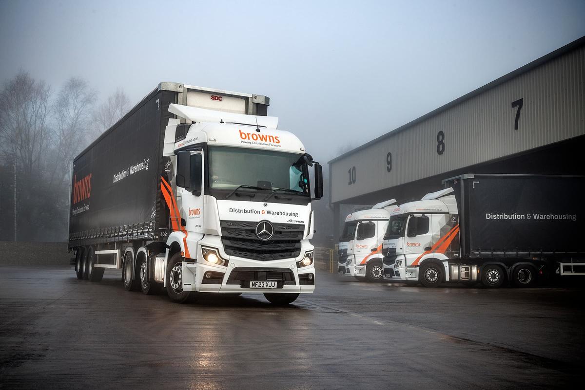 Three Browns trucks on a misty winter morning.